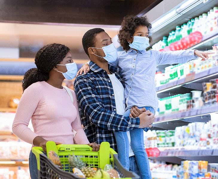 Shopping During Covid-19 Outbreak. Young Black Family Wearing Di
